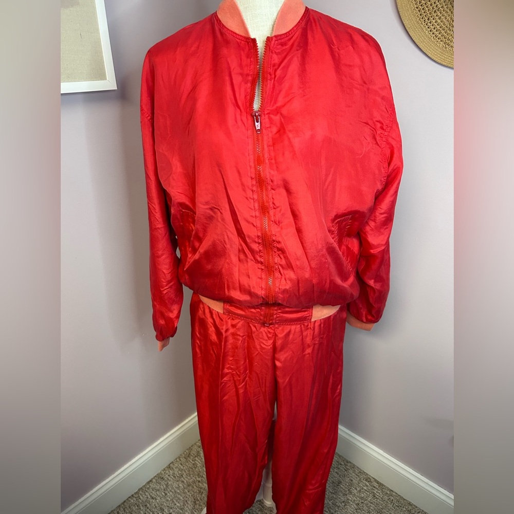 Details Express women’s small windsuit. Jogger type pants & zip up jacket